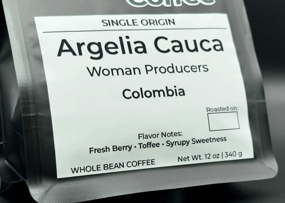 Close-up of white label on Doctopus Coffee bag detailing Argelia Cauca Single Origin coffee from Colombian women producers, with flavor notes of Fresh Berry, Toffee, and Syrupy Sweetness