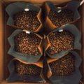 Bags of Doctopus Roaster’s Choice coffee fresh beans packed in bags